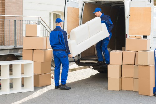 Careful loading of household items for a Barbican removal