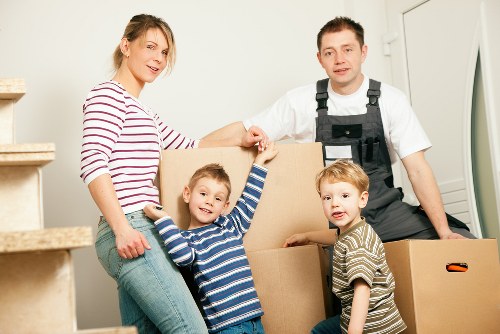 Quotation paperwork and moving boxes representing a free Barbican removals quote