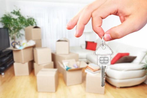 Packed boxes and furniture prepared for a Barbican move