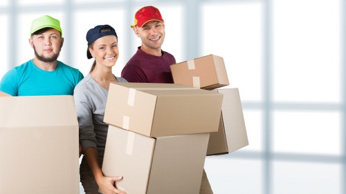 Packed boxes and furniture ready for collection in Barbican