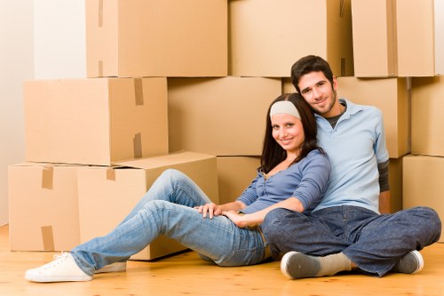 Local moving truck loading furniture in central London