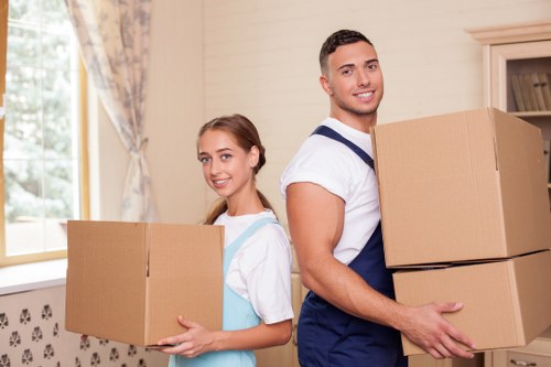 Unpacking belongings into a new Barbican apartment