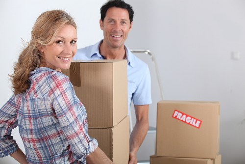 Office furniture and boxes being prepared for a Barbican commercial move