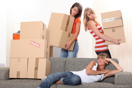 Packed boxes and furniture prepared for a Barbican home relocation